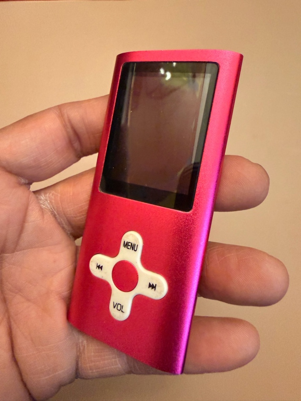 Sleek Pink Portable MP3 Player with Intuitive Menu Controls